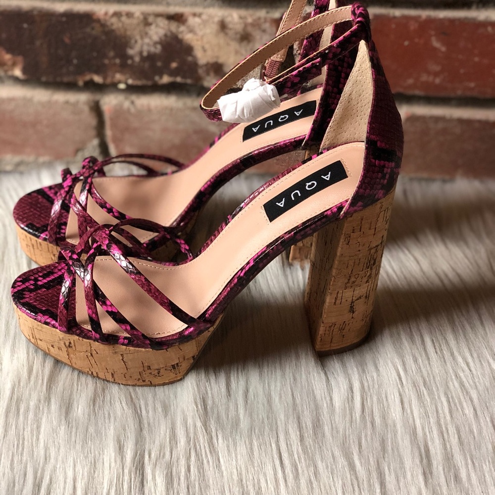 Woman’s aqua high heels